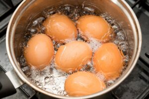 Pan of boiling eggs